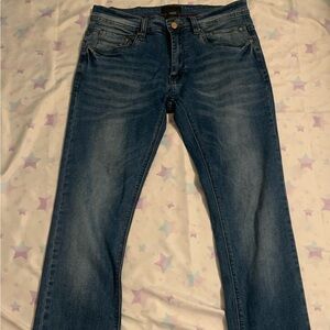 Steve's Jeans Men's stretch denim jeans in blue, size 30/32. Made in China.